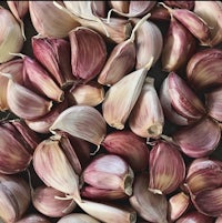 a pile of garlic on a table